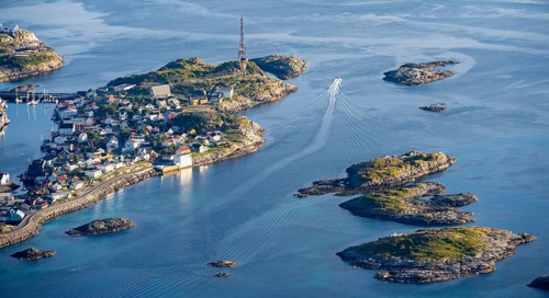 Houses on small rocky islands in the sea, view of Henningsvær, Vågan, Lofoten, Nordland, Norway