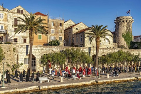 Procession of St Mark in the old town centre of Korcula, Croatia