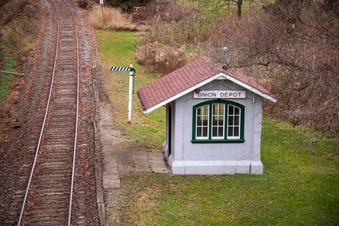 St. Thomas, Ontario, Canada - A tiny, no longer used railroad station sits along the London & Port