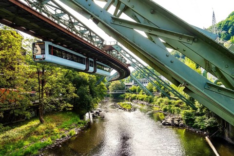 The Wuppertal suspension railway runs through a historic district and industrial area near the