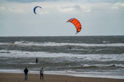 Kitesurfer on the beach of Egmond aan Zee, North Holland, Netherlands