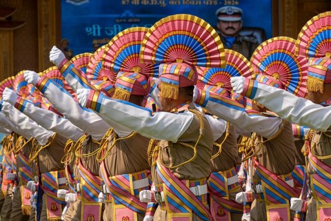 Central Reserve Police Force (CRPF) personnels march in ceremonial formation during a parade held