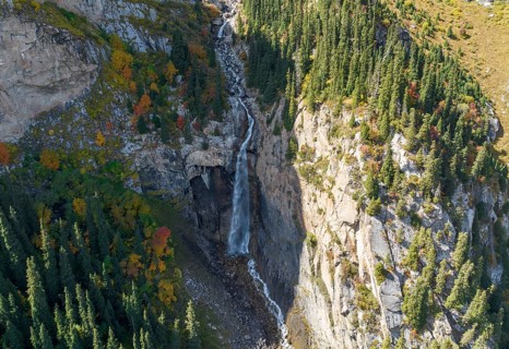 Aerial view, Barskon or Barskoon waterfall, mountain landscape with waterfall in a mountain valley,