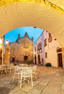 Ostuni Cathedral square seen through the Arco Scoppa archway, Apulia, Puglia, Italy