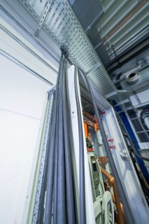Cable routing through a switch box in an industrial environment, switch cabinet construction, PV