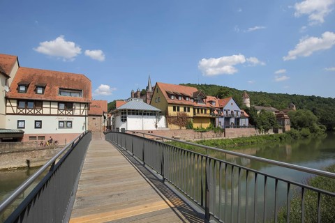 Pedestrian bridge over the Tauber, cityscape, Wertheim, Baden-Württemberg, Germany