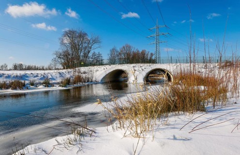 Bottrop, North Rhine-Westphalia, Germany - Sunny winter landscape in the Ruhr area, ice and snow on