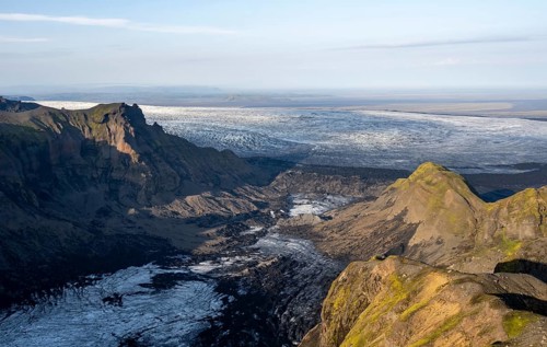 Impressive landscape with mountains and glaciers in the evening light, glacier tongues Huldujökull