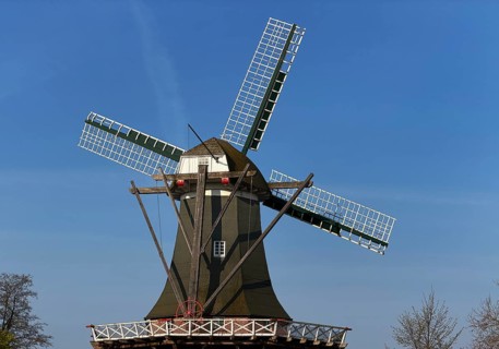 Meyer Mühle or Meyers Mühle with millstone fountain on the main canal, Papenburg, Emsland, Lower