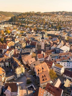 Beautiful urban panorama with a church tower in the centre in spring, Nagold, Black Forest, Germany