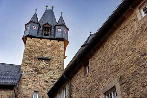 Detailed view of a stone tower against the sky, part of a castle, Spangenberg Castle