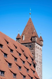 Detailed view of the Kaiserburg with the Luginsland Tower built in 1377 with the roof of the