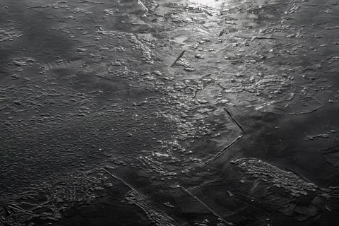 Frozen lake, structures of the water surface
