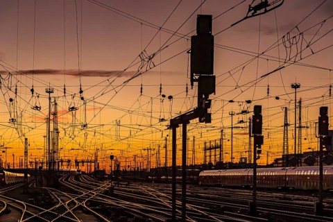 Track apron with trains, rails, points, pylons and signalling systems. Infrastructure at the main