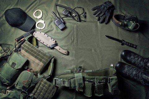 Military equipment or special agent gear concept flat lay background with copy space.