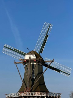 Meyer Mühle or Meyers Mühle with millstone fountain on the main canal, Papenburg, Emsland, Lower
