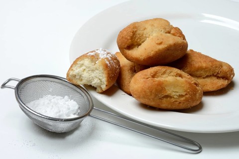 Schenkeli on a plate, sweet pastry for carnival time, Switzerland