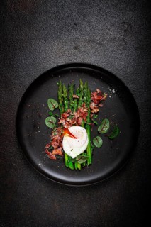 Asparagus with poached egg and fried bacon, micro greens and spices, breakfast, homemade, no people