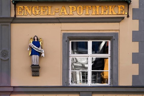Wall figure, angel, Engel-Apotheke, Altstadt, Lindau, Bavaria, Lake Constance, Germany