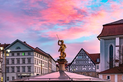 The golden town saint St George on the Georgsbrunnen fountain on the market square in Eisenach,