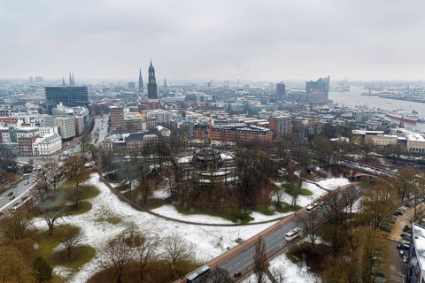 View from above of the Hamburg Michel and the city in the haze, dreary winter weather, remnants of