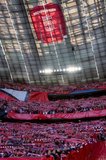 Larger-than-life jersey of Franz Beckenbauer with shirt number 5 hangs in the roof of the south