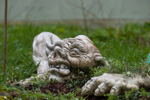 Grotesque figure in a garden, Bavaria, Germany
