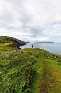 Walkers on footpath, coastline between Ballycastle and Ballintoy, viewpoint, Causeway Coastal