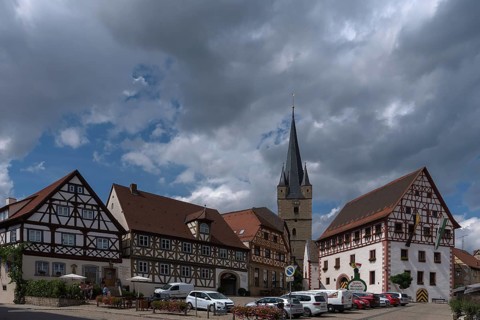 Historic half-timbered houses, St. Michael and town hall on the market square, Zeil am Main, Lower