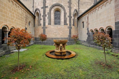 Courtyard with lion fountain in autumn colors, Romanesque, Maria Laach, Benedictine Abbey, Eifel,