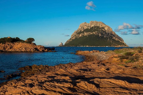 Picturesque beach and island, sunset, Isola di Tavolara, Porto San Paolo, Sardinia, Italy