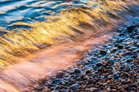 Wave play at sunrise on the chalk coast in Jasmund National Park, Rügen, Sassnitz,