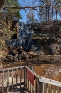 Water diverted from nearby Chunky River to this man-made waterfall to power a grist and cotton mill