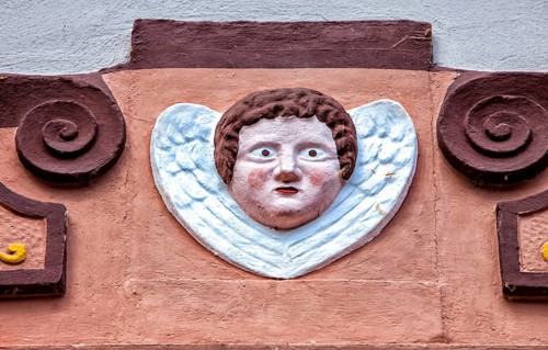 Old angel figure, late Renaissance stone carving, Rinnesches Haus, Kornmarkt, Osterode am Harz,