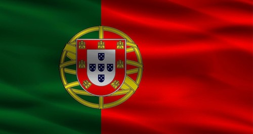 Portugal flag with fabric texture. Realistic flag of Portugal waving