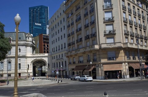 Modern city street with tall buildings and passing cars, Buenos Aires, Argengtinia, South America
