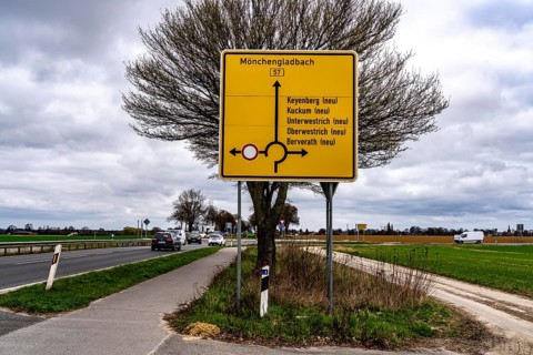 Signpost to the resettlement sites of the 5 villages from the Garzweiler II opencast lignite mining