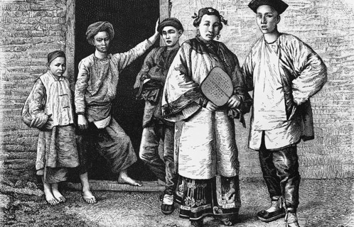 Group of young southern Chinese in front of a house in the province, view from the front, young men