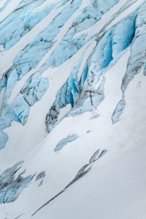 Blue rugged glacier ice with crevasses and snow, detail, Exit Glacier, Kenai Peninsula, Alaska, USA