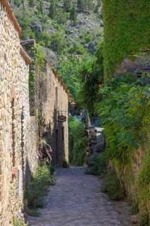 Narrow alley in the medieval town of Castelnou, Département Pyrénées-Oriental, France