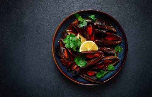 Mussels in tomato sauce, homemade, no people