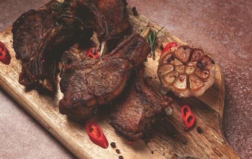 Fried veal ribs, with spices, baked in the oven, homemade, no people