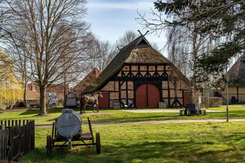 Thatched-roof farmhouse in the Klockenhagen open-air museum, Ribnitz-Damgarten,
