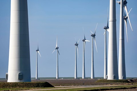Wind farm in the north of the Netherlands, near Eemshaven, energy center, in addition to wind