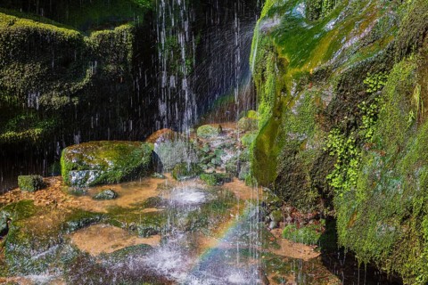 Splashing water of the Amsel Falls, a waterfall near the village of Rathen in Saxon Switzerland