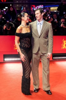 Dua Lipa and Callum Turner on the Red Carpet in front of the premiere of Rosebush Pruning at the