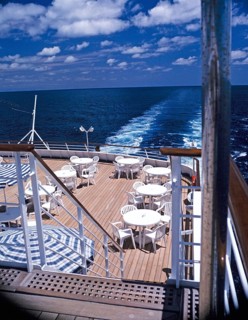 On board the cruise ship MV Minerva of Swan Hellenic holiday cruises Deck and stern wave in the sea