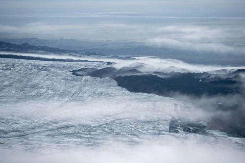 Fog, clouds rising from the glacier in the evening, Myrdalsjökull glacier, Pakgil, Iceland