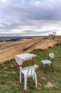 Edge of the Garzweiler II open-cast lignite mine, excavator, at the village of Lützerath, the last