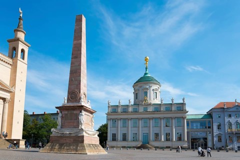 Obelisk in front of a historic building under a blue sky, Old Town Hall, Museum, Forum for Art and